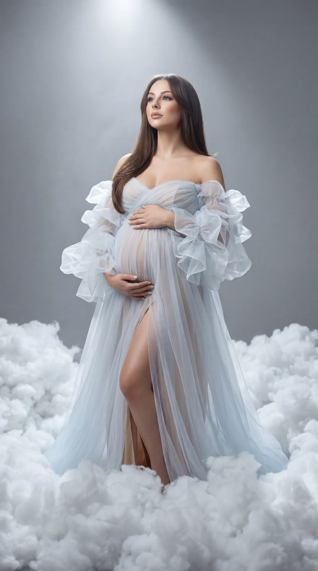 Ethereal studio maternity portrait, pregnant woman standing amid dense white faux clouds on a gray seamless, medium‑full shot, slight low angle, centered vertical frame; off‑shoulder sheer tulle gown in icy white/pale blue with voluminous organza ruffles 
