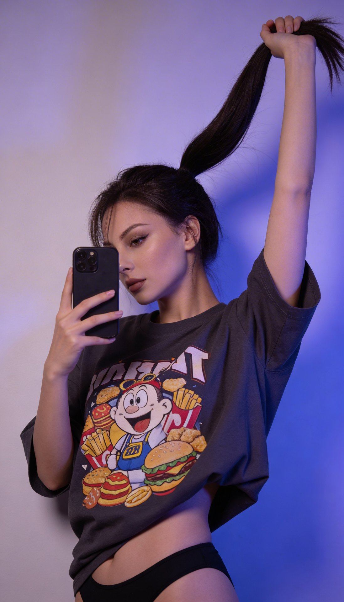 A girl is standing indoors against a plain wall illuminated with soft purple-blue lighting, giving the photo a moody, futuristic atmosphere. She is holding a smartphone in her right hand in front of her face, partially covering it, while her left arm is r