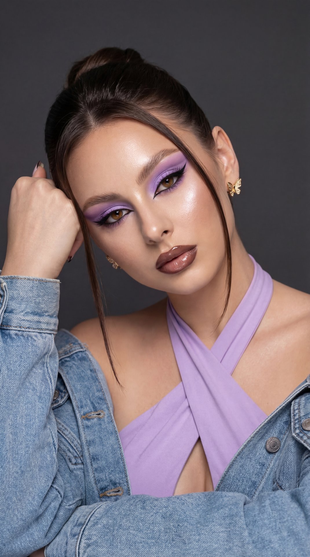 A girl captured in a high-end, glamorous beauty editorial portrait shot with professional studio lighting.

Pose and Body Language: The image is a close-up framing the head and shoulders. Her head is tilted significantly to the left (viewer's left), resti