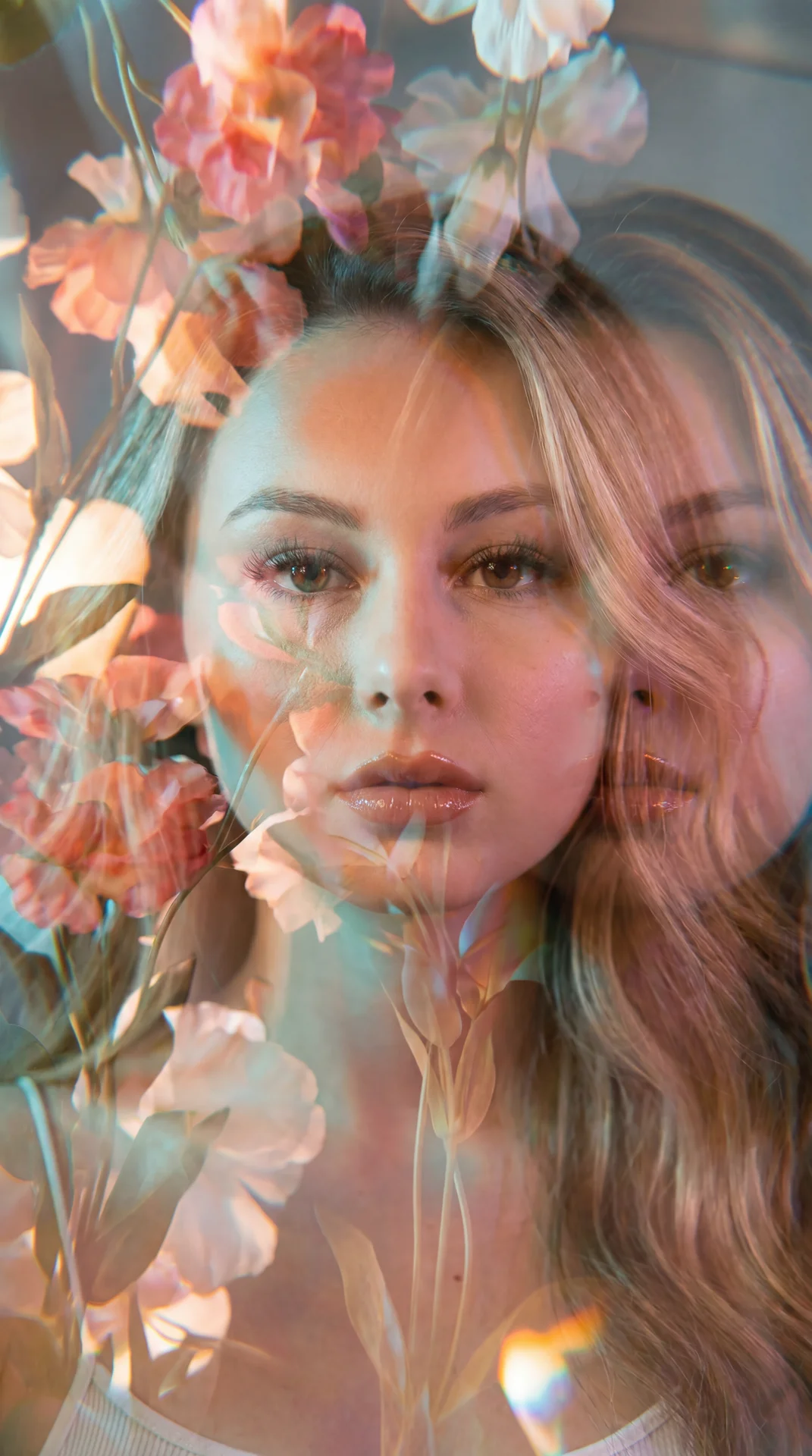 Create image: use the attached image as the main facial reference with high precision while preserving facial essence, facial continuity, recognizable identity, facial proportions, and natural asymmetry.

A female subject appears partially submerged insid