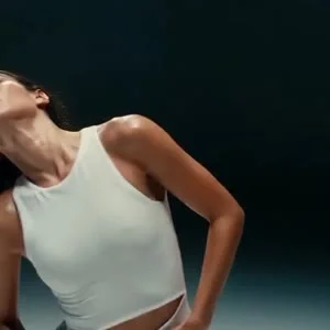 The exact same girl from the reference image1 — 100% identical face, hairstyle, outfit, body proportions, no changes whatsoever, clean idol skin with subtle glow.


She performs intense K-POP girl-crush dance break: aggressive hip shakes, deep body rolls,