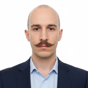Create a professional, high-resolution ID photo with a clean white background. The person should be centered in the frame, well-lit, and presented with balanced, even lighting free of harsh shadows. Maintain the person’s natural appearance while subtly en