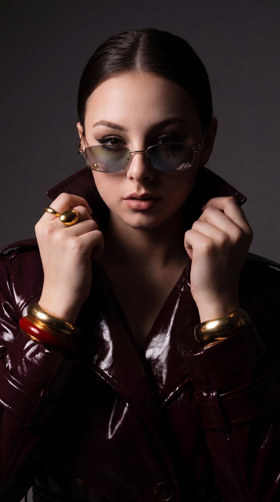 A Girl, split lighting, single side light, deep shadows on half face, high contrast, dramatic studio setup, edgy portraiture, bold and moody atmosphere, professional studio photography, 85mm lens