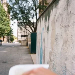 One continuous shot, static camera, no edits. Duration: 4 seconds.


Start exactly with the provided image, as in the first still shot—the person, naturally standing in the frame, completely photorealistic, with real depth, real shadows, part of the re