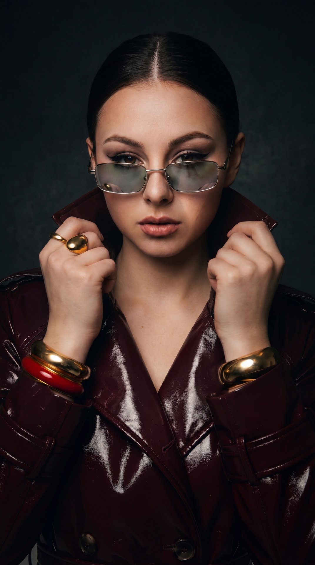 A Girl, Rembrandt lighting, classic studio portraiture, single key light at 45 degrees, subtle light triangle on cheek, dark studio background, dramatic atmosphere, fine art photography, hyper-realistic, masterpiece