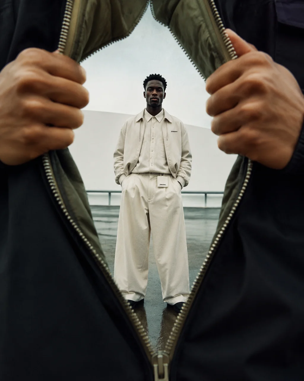Creative frame-within-frame editorial portrait.