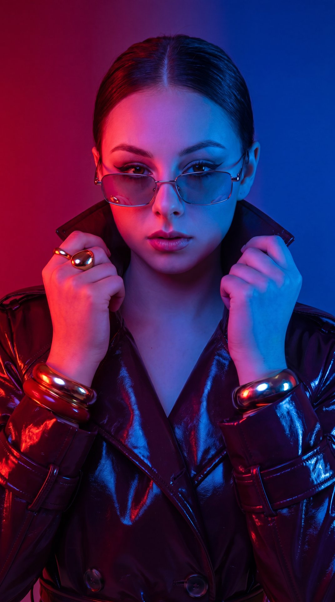 A Girl, studio gel lighting, dual color RGB lighting, red and blue gel flashes, modern editorial photography, creative studio setup, highly stylized, vibrant glowing reflections, sharp focus.